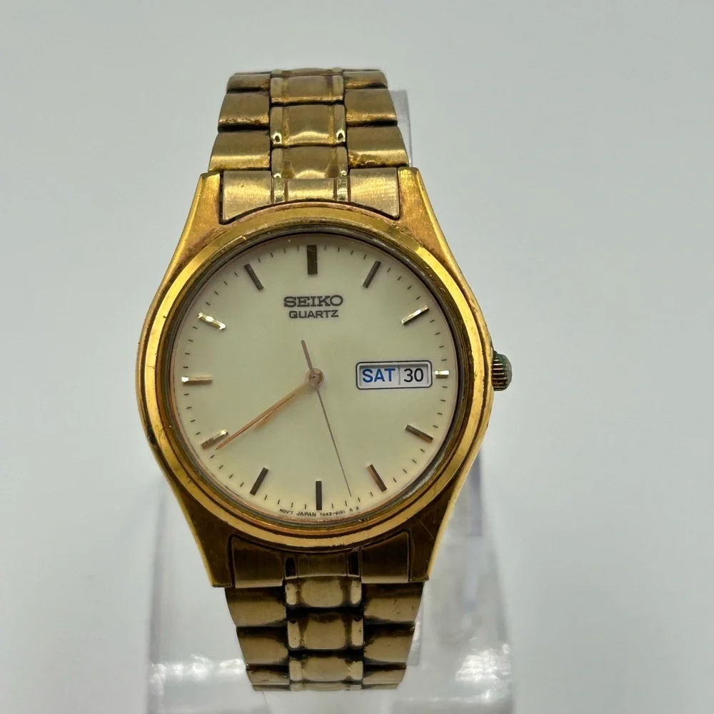 Vintage Seiko Quartz Light In Dark Men’s Gold Tone Date Day Watch #577